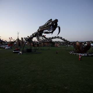 Dragon Sculpture on the Grass at Dusk