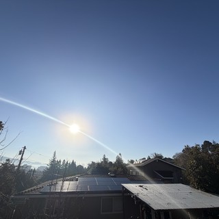 Solar Panels and Suburban Sunset in California Neighborhood