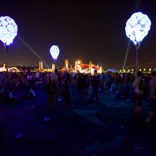 Nighttime Crowd with Balloons at Cochella Festival