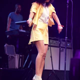 Solange Shines on Stage in Yellow