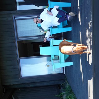 Relaxing on Deck with Faithful Dog Companion