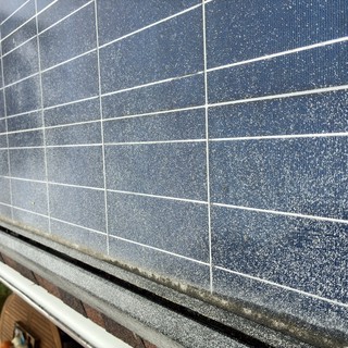 Dew-Covered Solar Panel Array at Dawn
