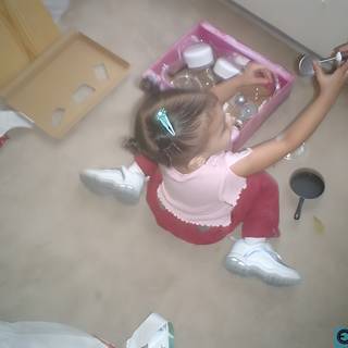 Little Girl with Her Shoes and Accessories
