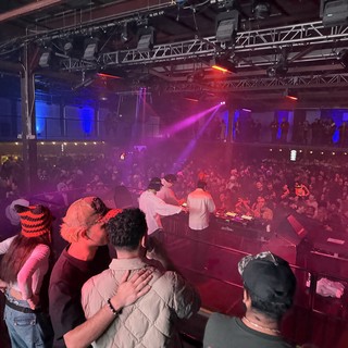 Electronic Music DJ Performance at Nightclub Venue