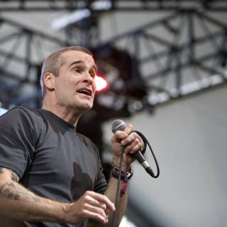 Henry Rollins: Tattooed Singer with Mic