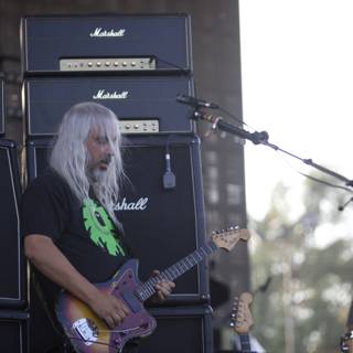 White-Haired Guitarist Rocks the Stage