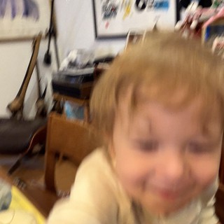 Blurred Childhood Moment in Creative Home Studio