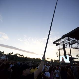 Man Holding Pole at Big Four Festival Concert