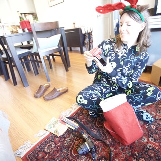 Joyful Christmas Morning Gift Opening in Skull Pajamas