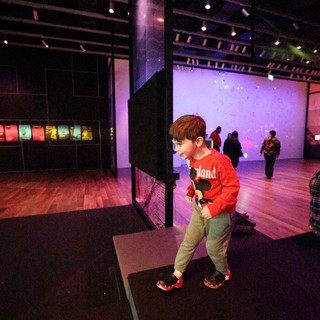 Young Child Dancing at Asian Art Museum Baby Rave