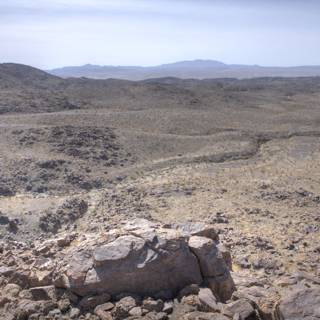 Rocky Desert Landscape with Majestic Mountain