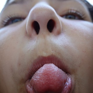 Close-up Portrait with Extended Tongue