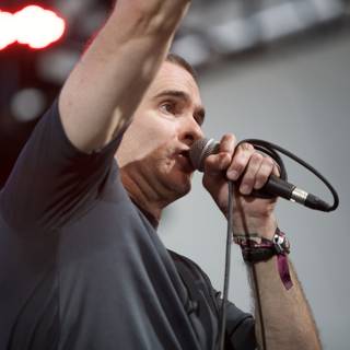 Henry Rollins Rocks the Stage with His Microphone