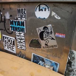 Urban Aspect: The Sticker Laden Trash Can