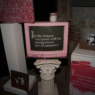 The Pink Screen with a Sign