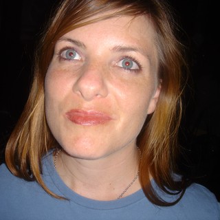 Woman with Red-Eye Effect Looks Upward Quizzically