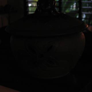 Silhouette of a Woman with a Pottery Pot