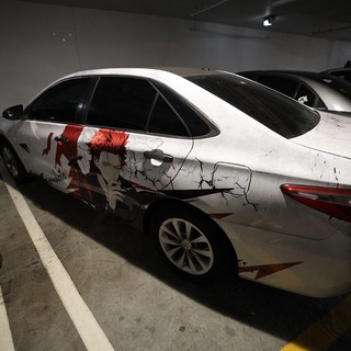 Anime-Wrapped Sports Car in Underground Parking Garage