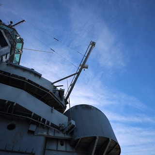USS Hornet Bridge and Mast Against Blue Sky