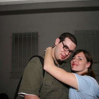 Couple Embracing at New Year's Eve Party 2005