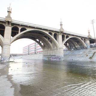 Arch Bridge Over a Busy Waterway