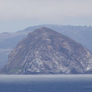 Majestic Morro Rock Amidst Misty Waters
