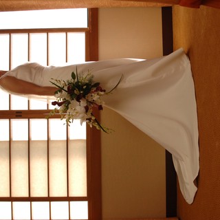 Radiant Bride Poses in Elegant Wedding Gown