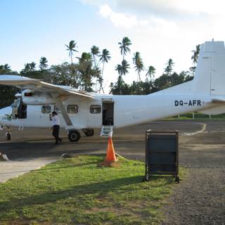 Small Plane on a Tropical Airfield