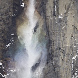 Yosemite Waterfall Mist Against Granite Cliff Face