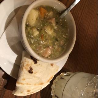 A Warm Bowl of Soup with a Side of Tortilla