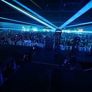 Massive Crowd Electrified by Laser Light Show