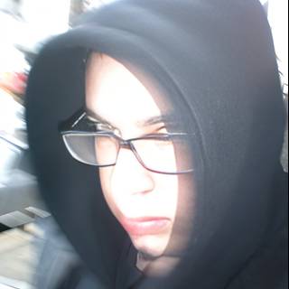 Blurry Portrait of Woman in Black Hoodie