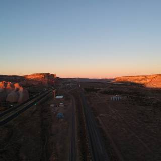 Highway and Desert Sunset Aerial View