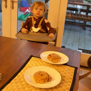 Toddler Awaiting Christmas Breakfast at the Table