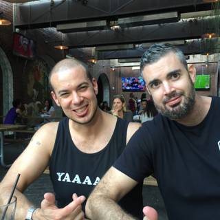 Two Men Enjoy a Drink at a Local Pub