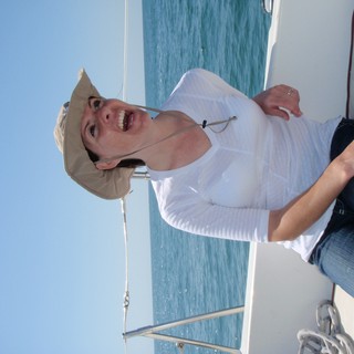 Joyful Woman Sailing on Open Waters