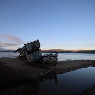 Abandoned Shipwreck at Twilight on California Coast