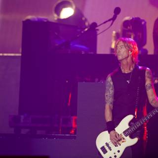 Duff McKagan Rocks Coachella Stage with Guitar and Tattoos