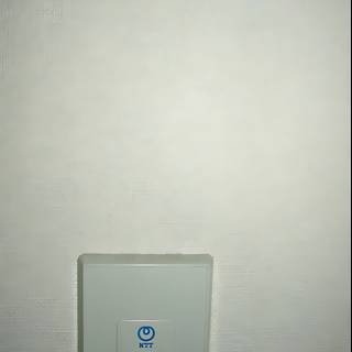 Blue Switch on White Wall