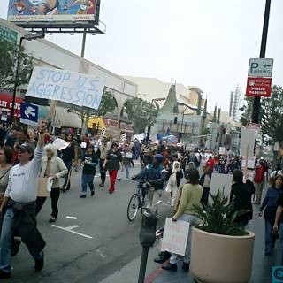 Protestors march through bustling city streets