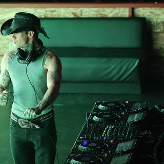 Tattooed DJ in Cowboy Hat at Wobbleland Festival