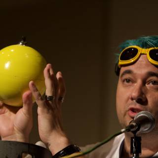 Blue-Haired Man with Yellow Ball