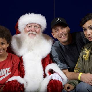 A Merry Christmas Party with Santa, Children, and a Man