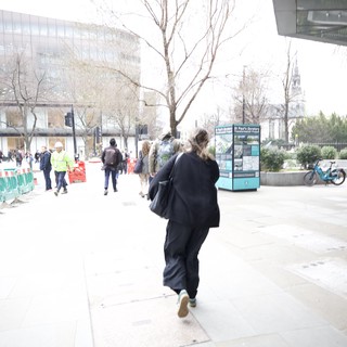 Morning Commute Through London's Modern Urban Plaza