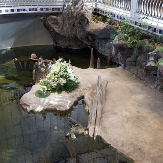 Memorial Turtle Habitat with Floral Tribute Display
