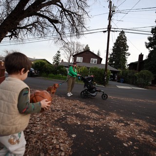 Family Sunday Walk in Residential Neighborhood