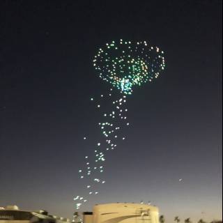 Green Balloon Soaring Above a Night Sky