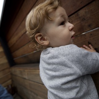 Curious Toddler Gazing Upward in Wonder