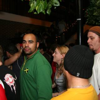 Green Shirted Man at a Vibrant Nightclub