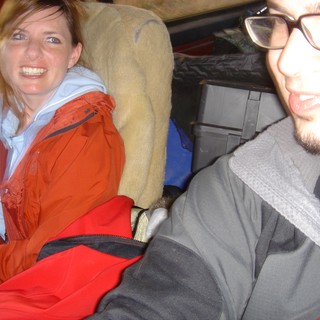Friends Packed Into a Red Truck on Adventure